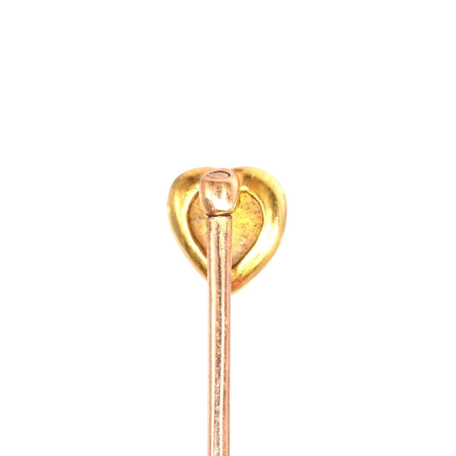 Small Edwardian 15ct gold tie pin featuring a colorful heart-shaped opal centerpiece, symbolizing romance.