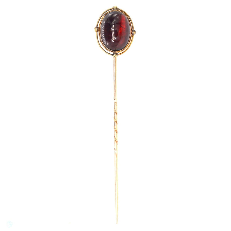 Victorian 15ct Gold Cabochon Garnet Tie Pin from the 1860s-1880s showcasing a stunning garnet gemstone.