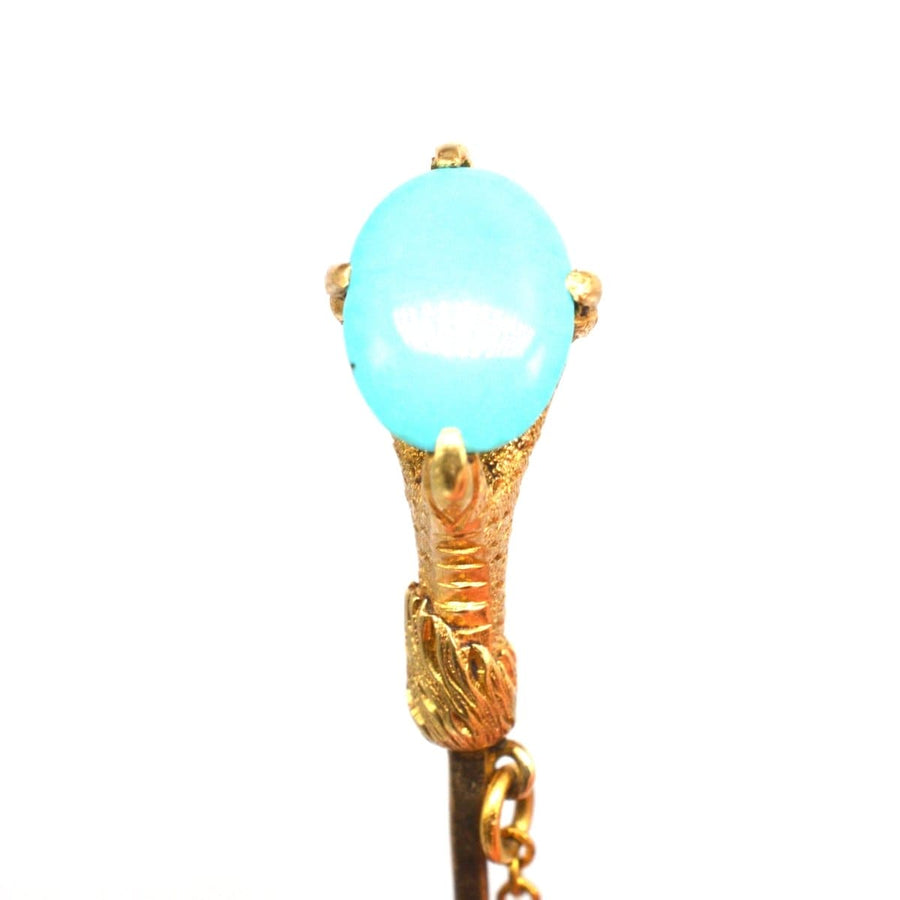 15ct gold tie pin featuring an eagle claw holding a turquoise gemstone, Victorian style jewelry.