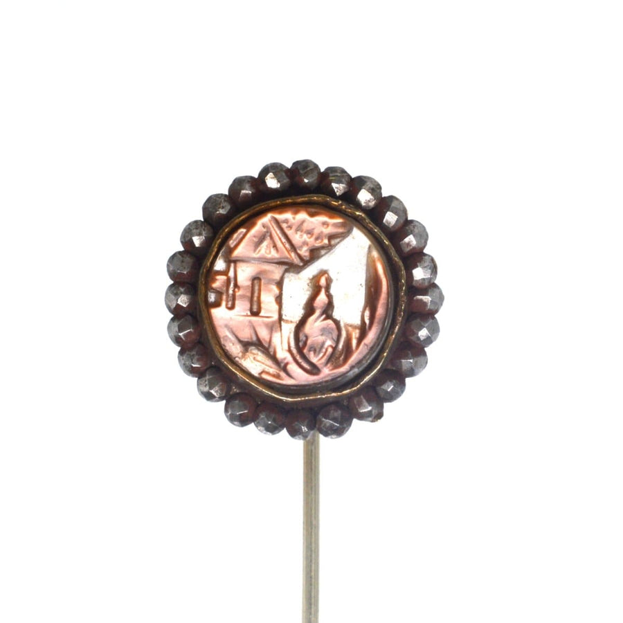 Victorian tie pin featuring carved brown mother of pearl and cut steel, depicting a house and lady, 19th century charm.
