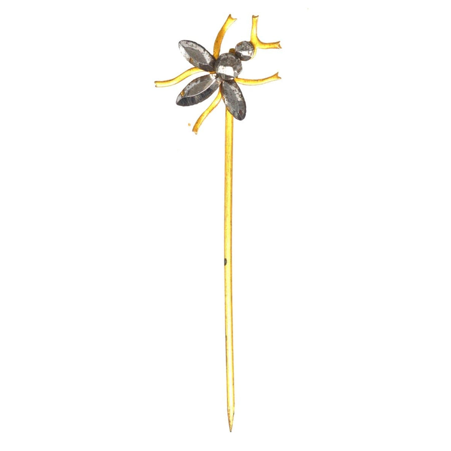 Victorian cut steel insect tie pin featuring polished steel studs reflecting light elegantly.