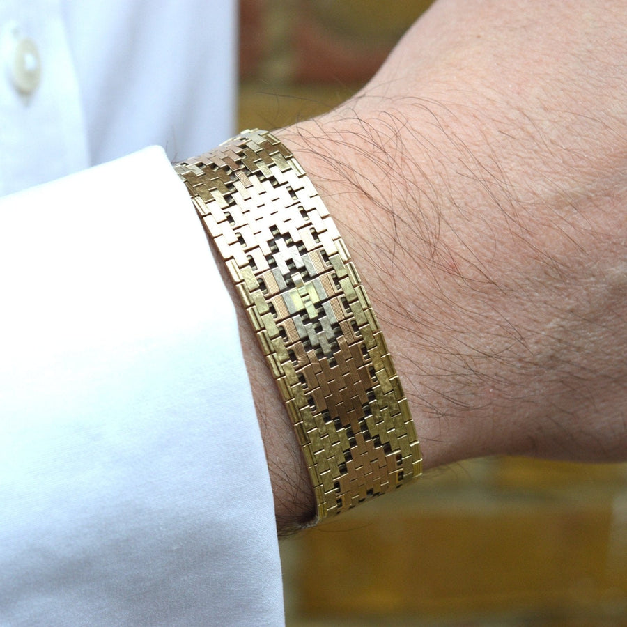 1970s three color 9ct gold weave bracelet worn on wrist, showcasing geometric design and craftsmanship.