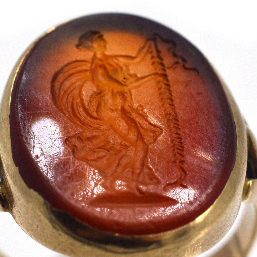 19th century 9ct gold ring featuring carnelian intaglio of Goddess Nike, symbolizing victory.