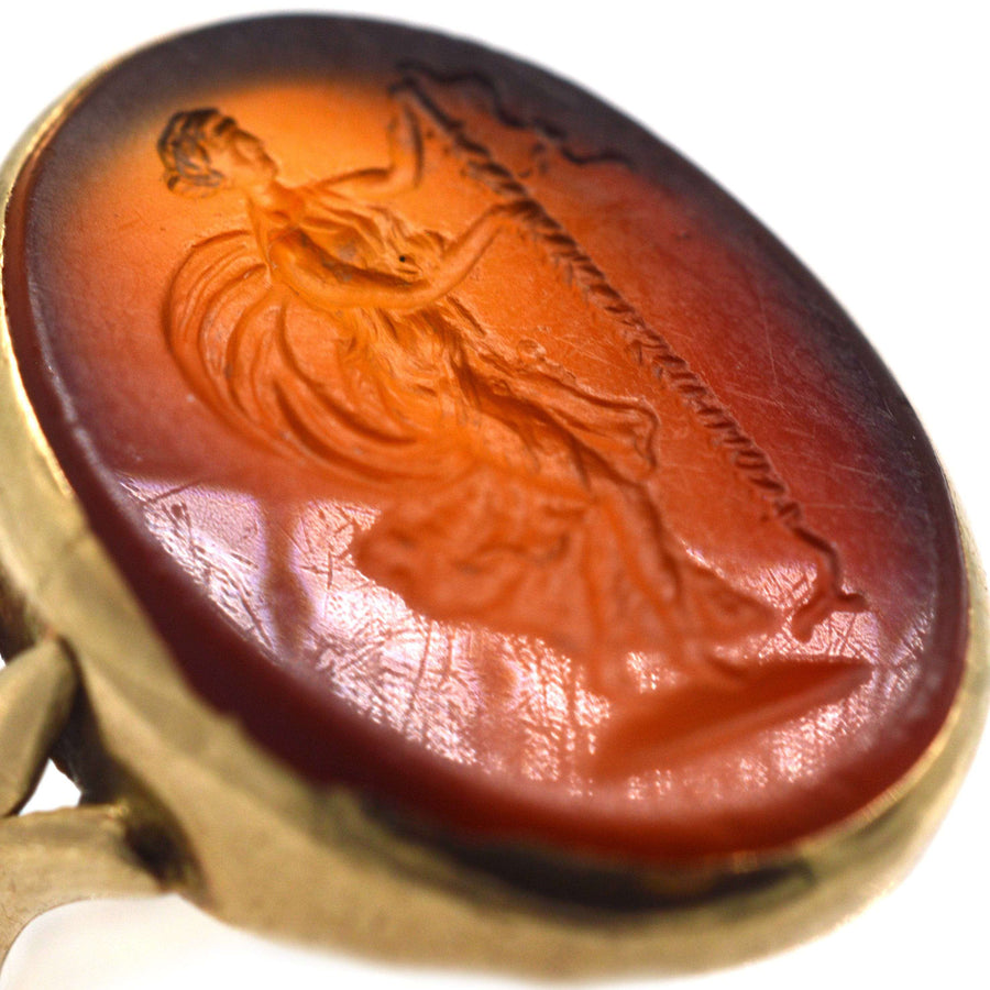 19th century 9ct gold carnelian ring featuring intaglio of Goddess Nike symbolizing victory.