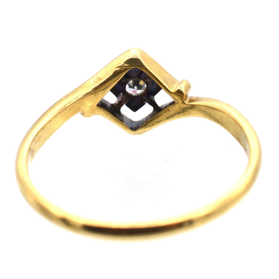 Art Deco 18ct gold & diamond solitaire twist ring with unique diamond-shaped frame, circa 1920s, elegant vintage engagement ring.