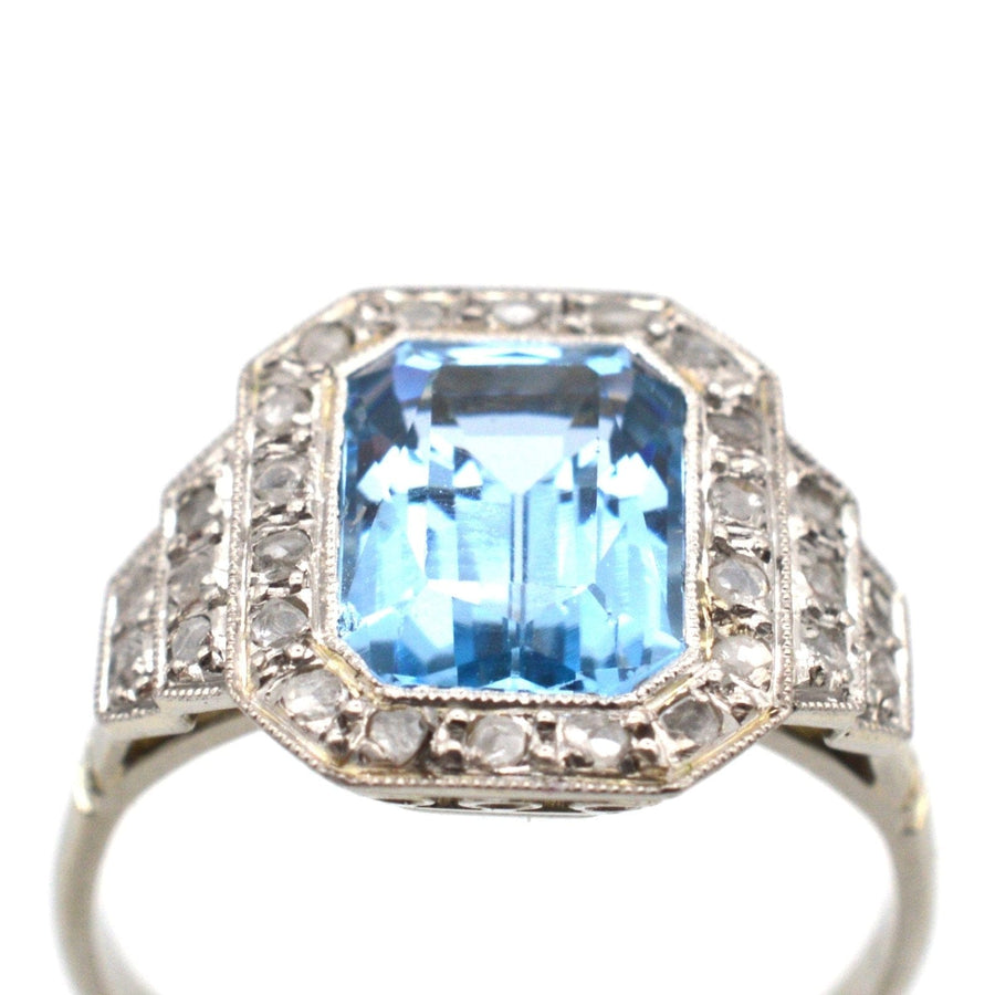 Art Deco blue spinel and diamond ring showcasing a large blue stone surrounded by diamonds, ideal for engagement or cocktail wear.