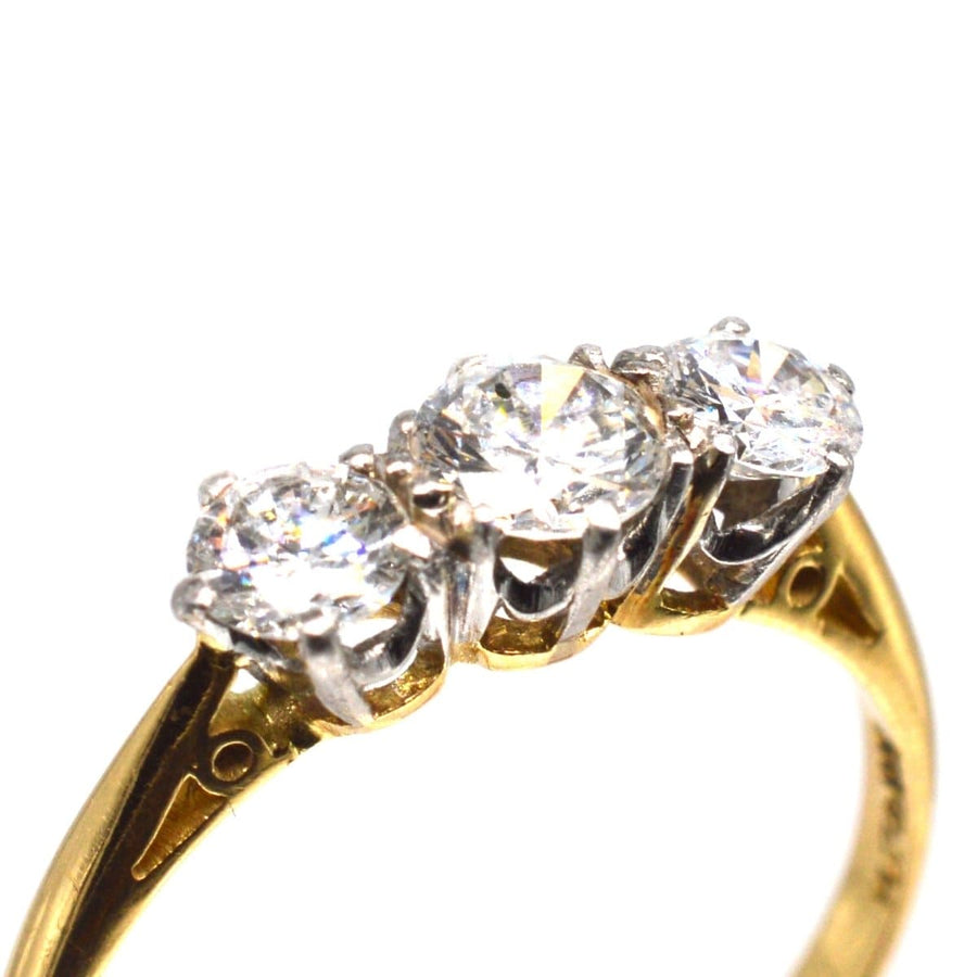 Art Deco platinum and 18ct gold three stone diamond ring, classic design with large bright stones, perfect for engagement.