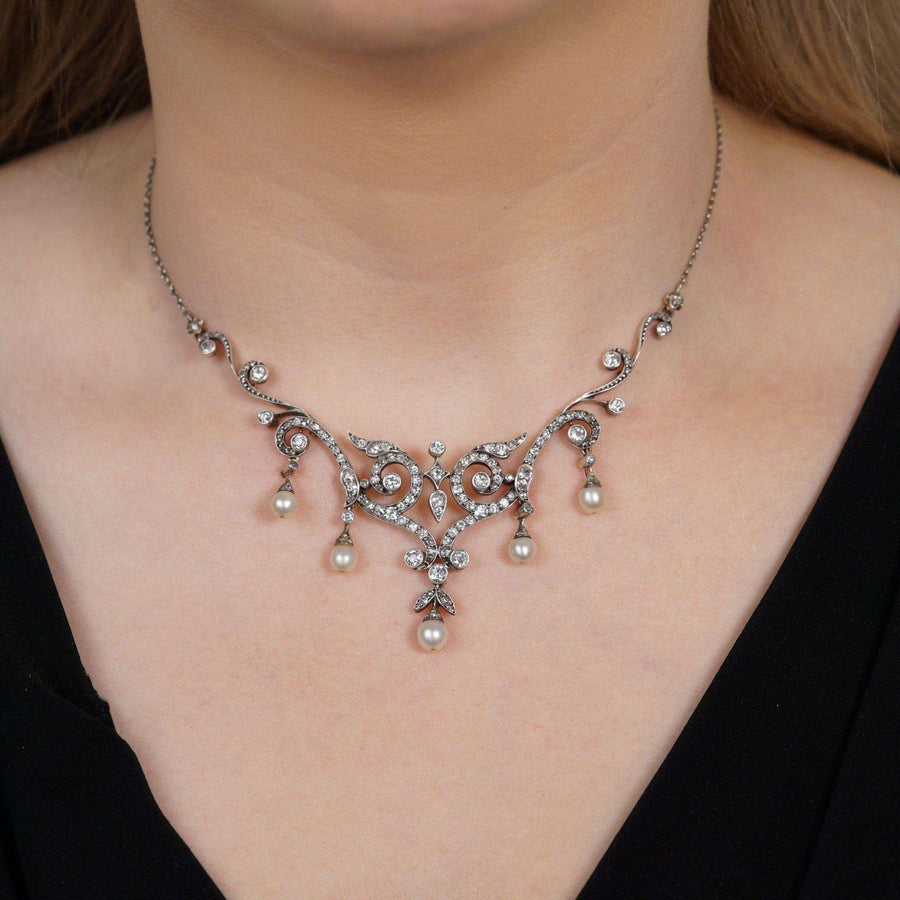 Edwardian 15ct gold and platinum necklace with natural pearls and diamonds, circa 1900, on a model.