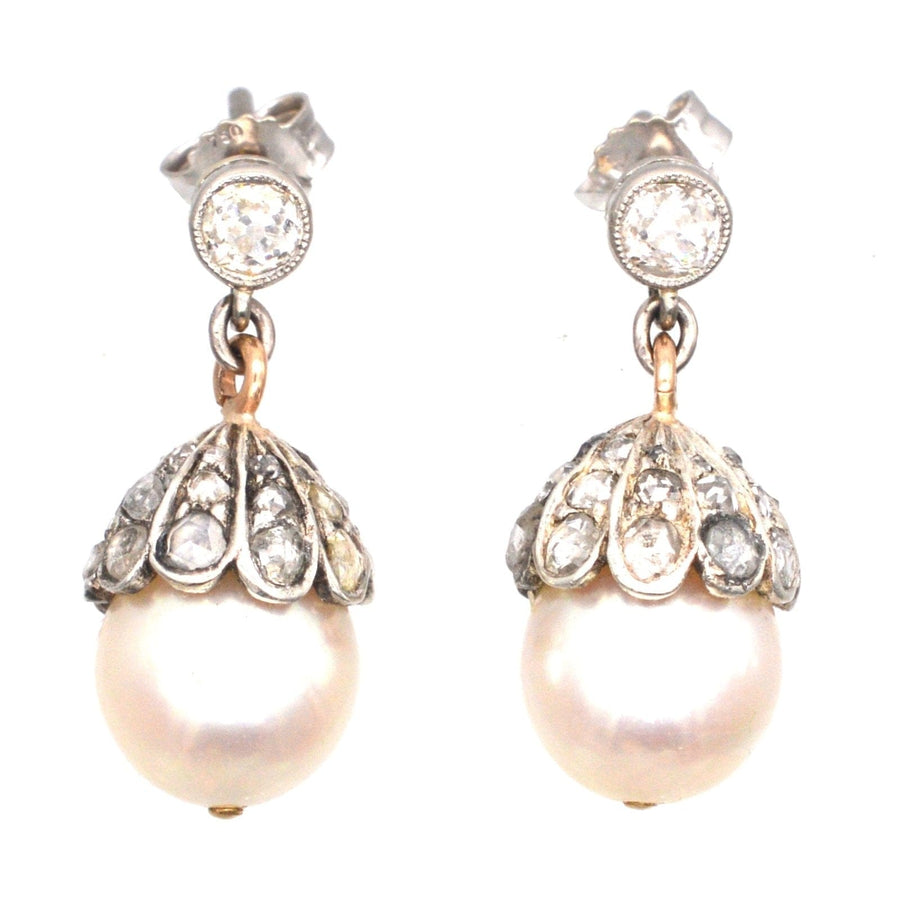 Edwardian 18ct white gold earrings featuring cultured pearls and rose diamonds in acorn design.