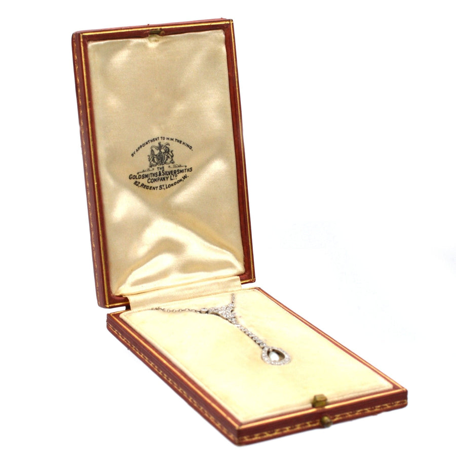 Edwardian platinum diamond and pearl drop pendant in original Goldsmiths & Silversmiths box.