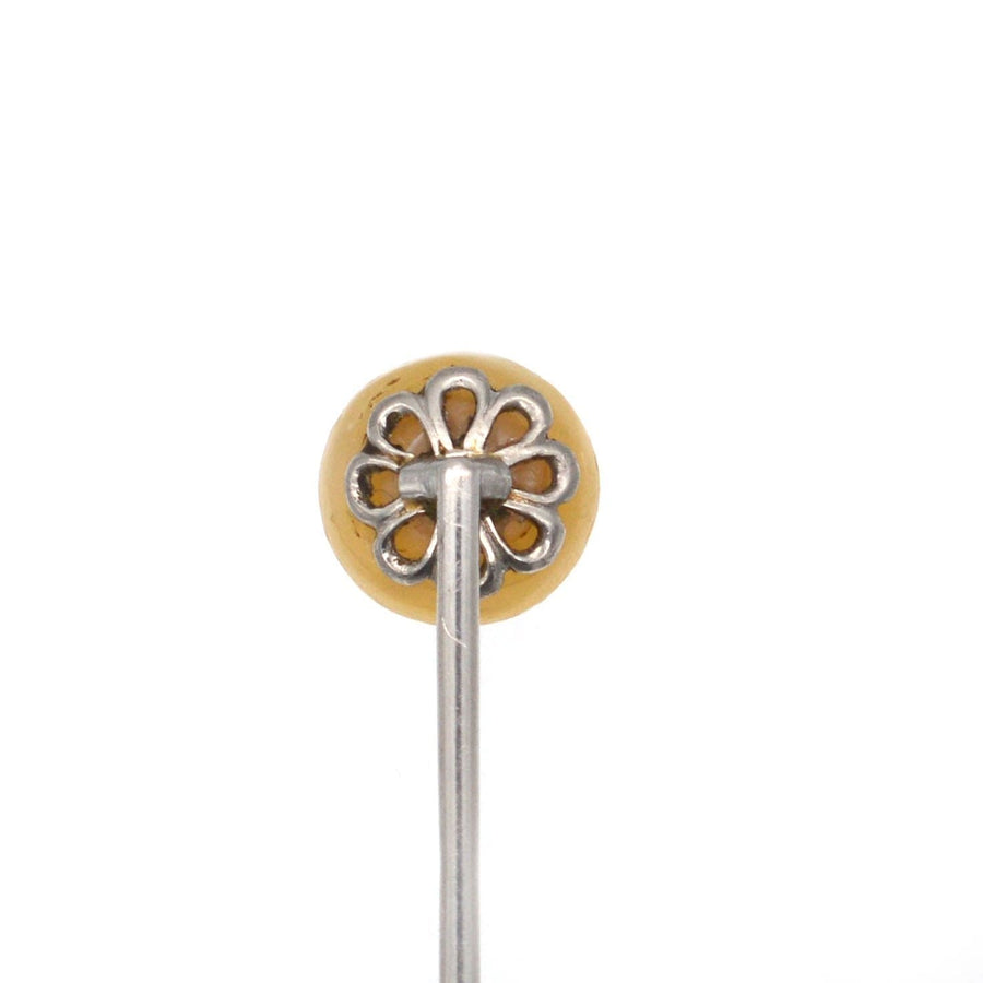 Edwardian platinum tie pin featuring a large natural pearl on a simple mount, perfect for enhancing any silk tie.