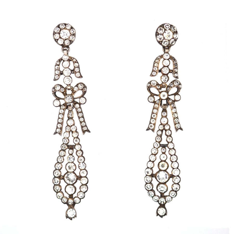 Large 19th century silver pendeloque bow paste earrings, elegant design with articulated movement, perfect for parties.