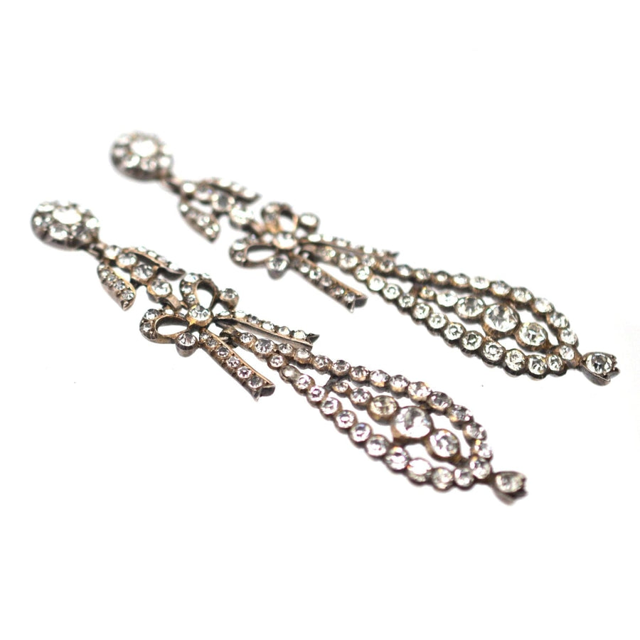 Large 19th century silver Portuguese style earrings with elegant bow and paste gemstones.