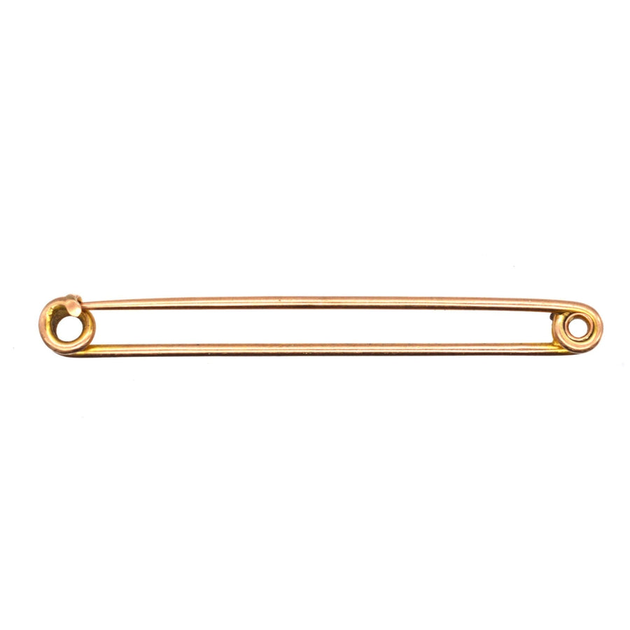 Large Victorian 9ct gold stock pin brooch, a historic safety pin used for fashion and practical purposes.