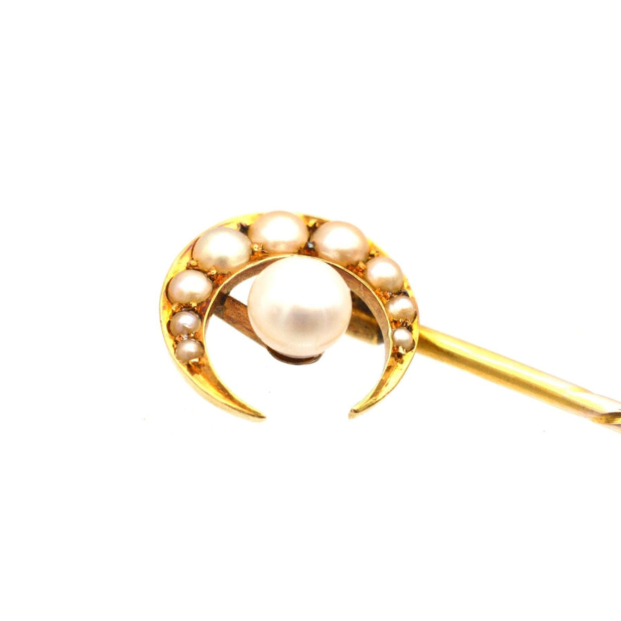 Late Victorian 15ct gold crescent moon tie pin with split pearls and a central pearl star.