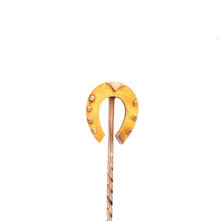 Late Victorian 15ct gold lucky horseshoe tie pin from 1894, symbolizing good luck and protection.