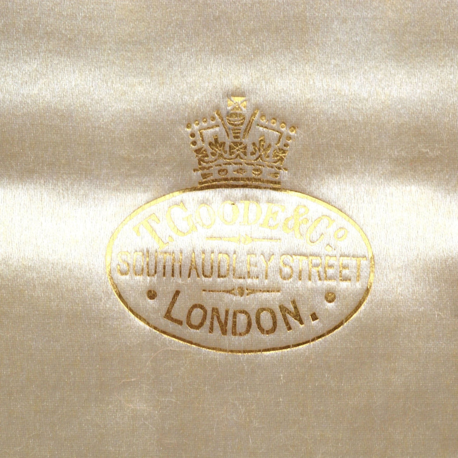 T. Goode & Co. logo embossed on silk, South Audley Street, London, vintage stamp from late 19th century cutlery.