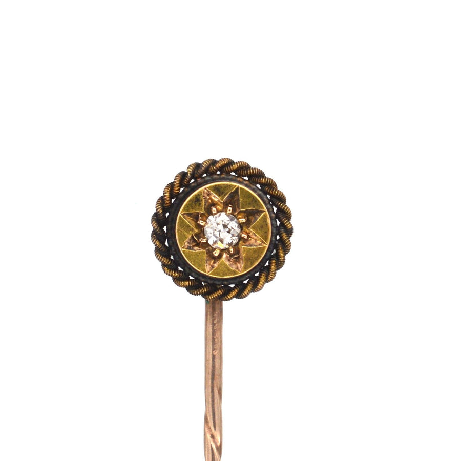 Victorian 15ct gold tie pin featuring a star motif and old cut diamond, crafted circa 1880s.
