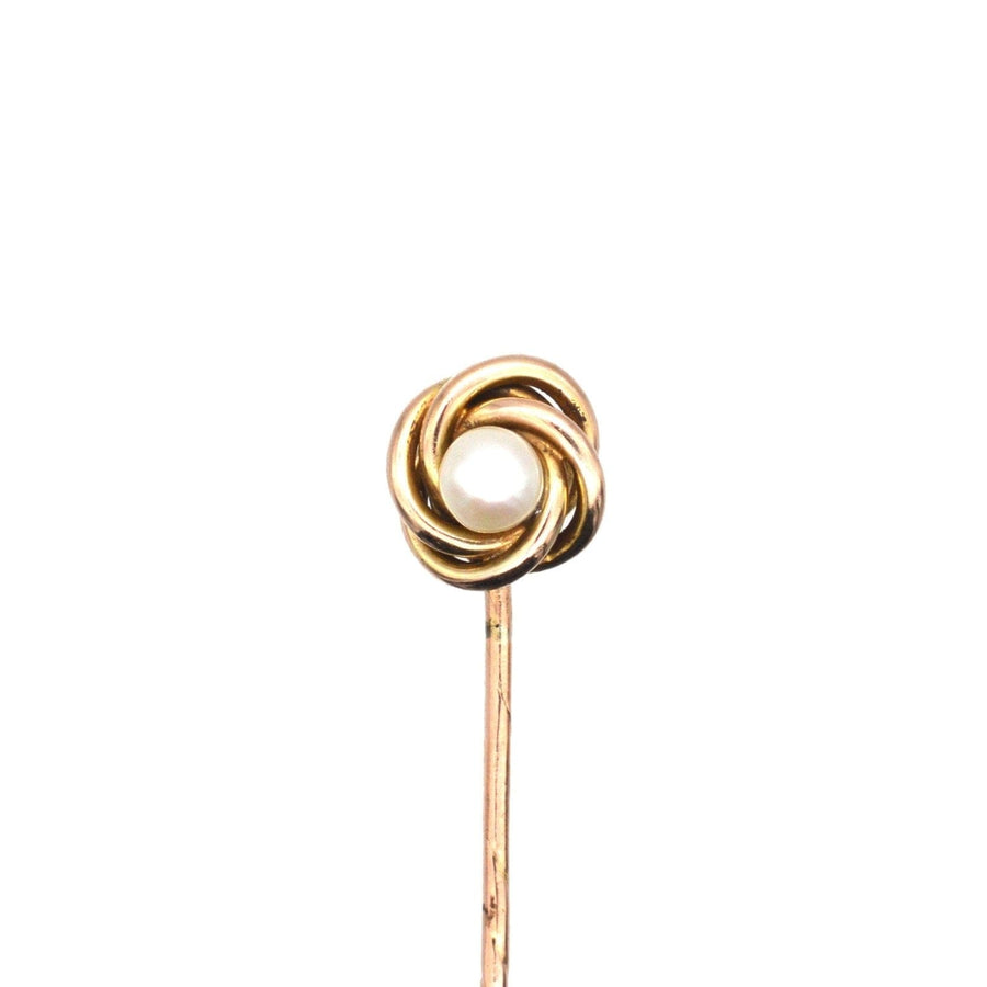 Victorian 9ct gold knot twist tie pin featuring a central lustrous pearl, elegant and timeless accessory from the 1880s.