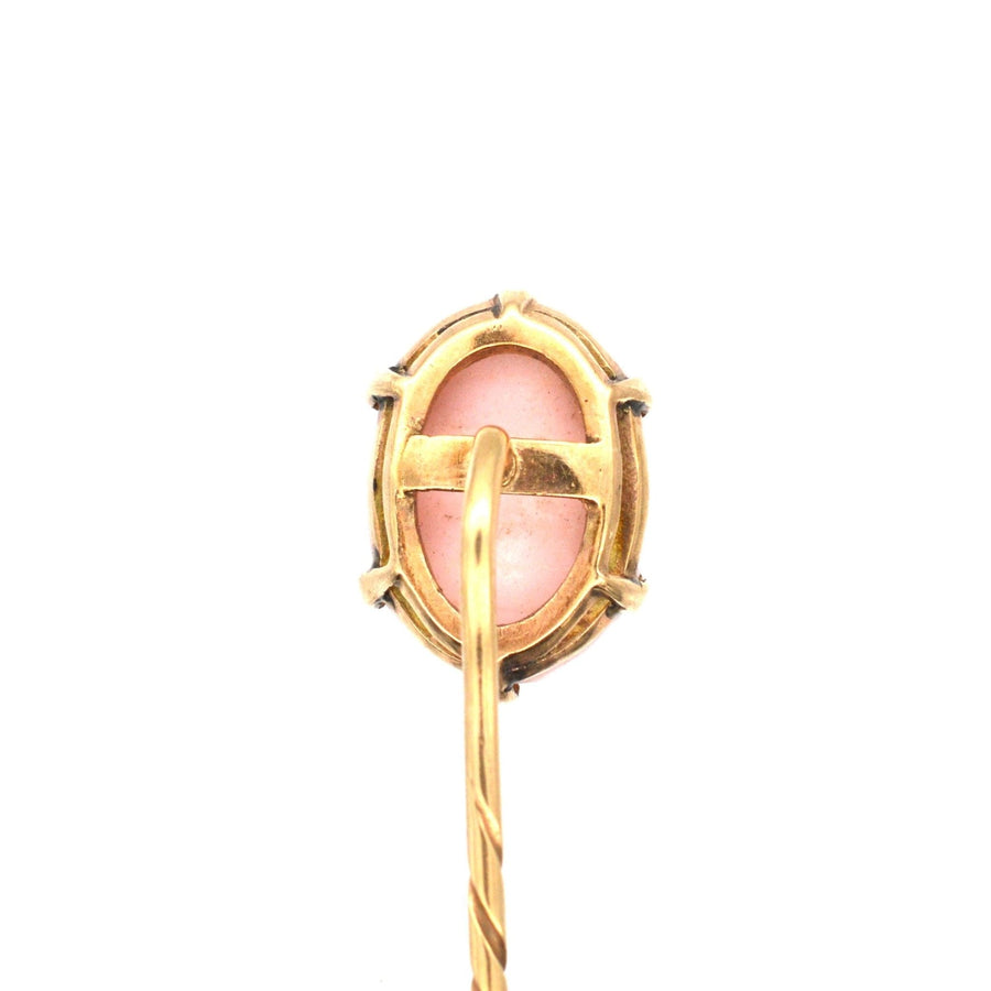 Victorian 9ct gold tie pin featuring a pink conch shell cameo of a Roman goddess, crafted in the 1880s.