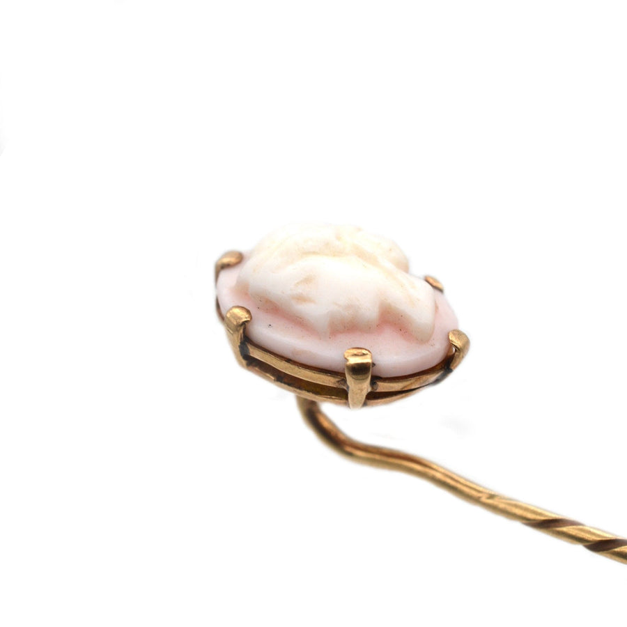 Victorian 9ct gold tie pin featuring a pink conch shell cameo of a Roman goddess, dating from the 1880s.