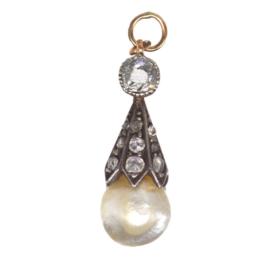 Victorian silver pendant featuring a natural saltwater pearl and diamond accents, perfect for antique jewelry collections.