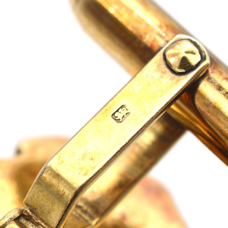 Close-up of vintage cufflink clasp showing stamp details from Sheffield, crafted by Jack Spencer in 1991.