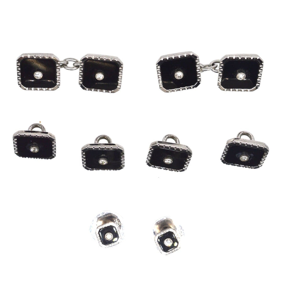 Art Deco 9ct white gold dress set featuring onyx and diamond cufflinks and studs in original case.