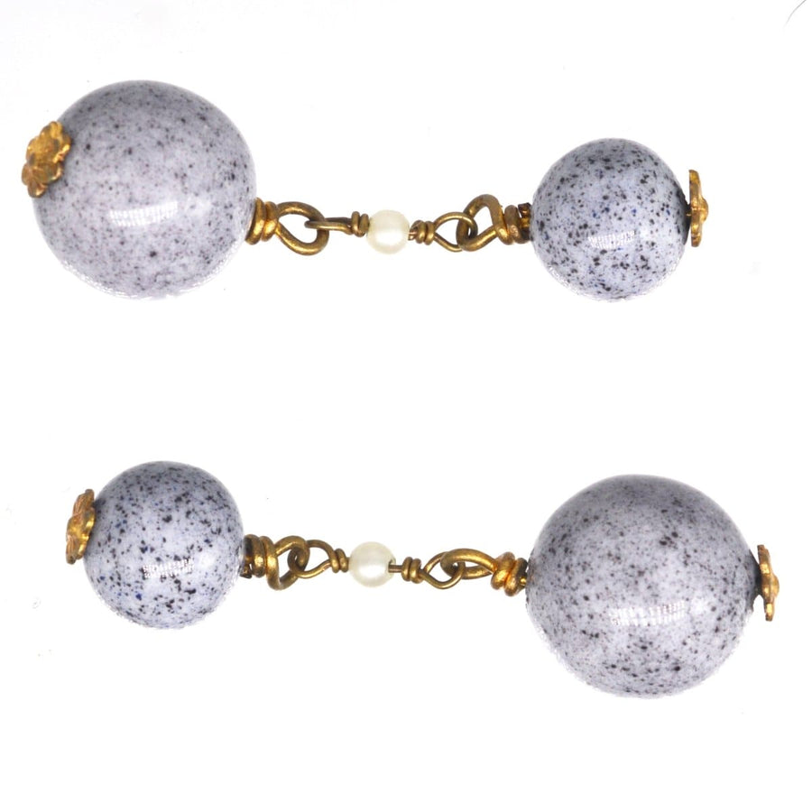 Art Deco cufflinks with speckled grey-blue glass beads, seed pearls, and gold tone flower accents.