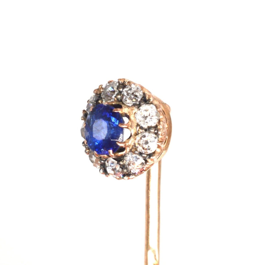 Edwardian 18ct rose gold tie pin featuring a blue sapphire center with diamond cluster, perfect for weddings and anniversaries.