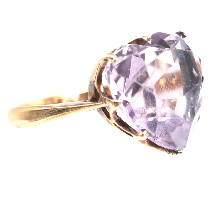 9ct gold ring featuring a large heart shaped amethyst, perfect for engagements or February birthdays.