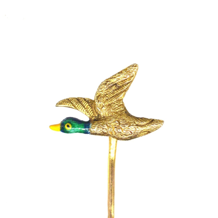 Edwardian 9ct gold and enamel duck tie pin, elegantly crafted for stylish gents, perfect for silk ties.