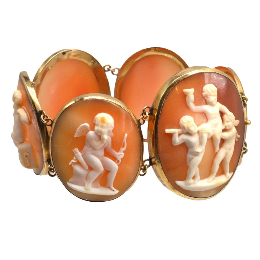 Vintage 18ct gold bracelet featuring hand-carved shell cameos of Cupid in various scenes, dating to the 1820s-1840s.