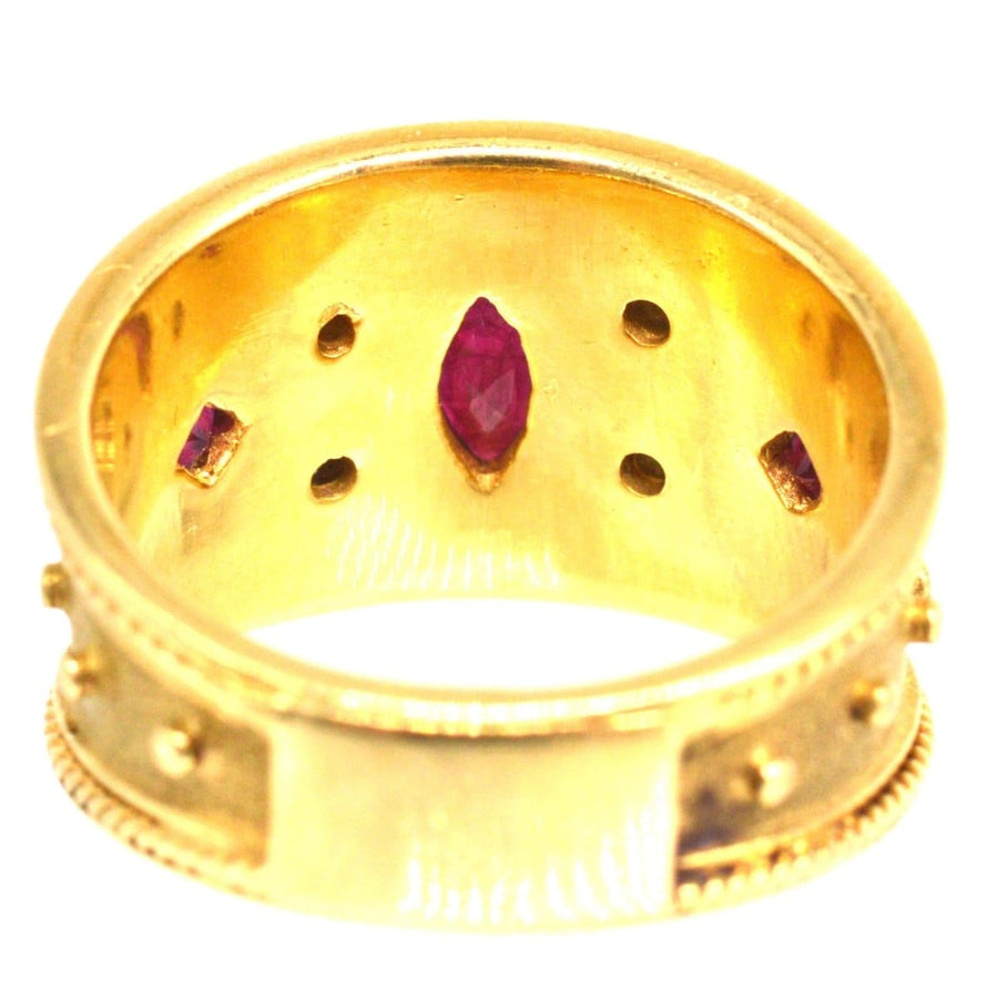 Vintage 18ct gold band ring featuring rubies and diamonds, designed in the style of Elizabeth Gage.
