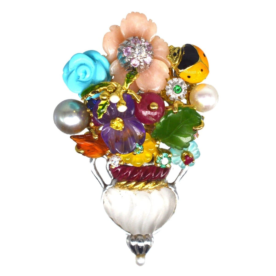 Vintage 18ct white gold brooch featuring a carved rock crystal vase with multi-gem flowers and a ladybird by Santagostino.