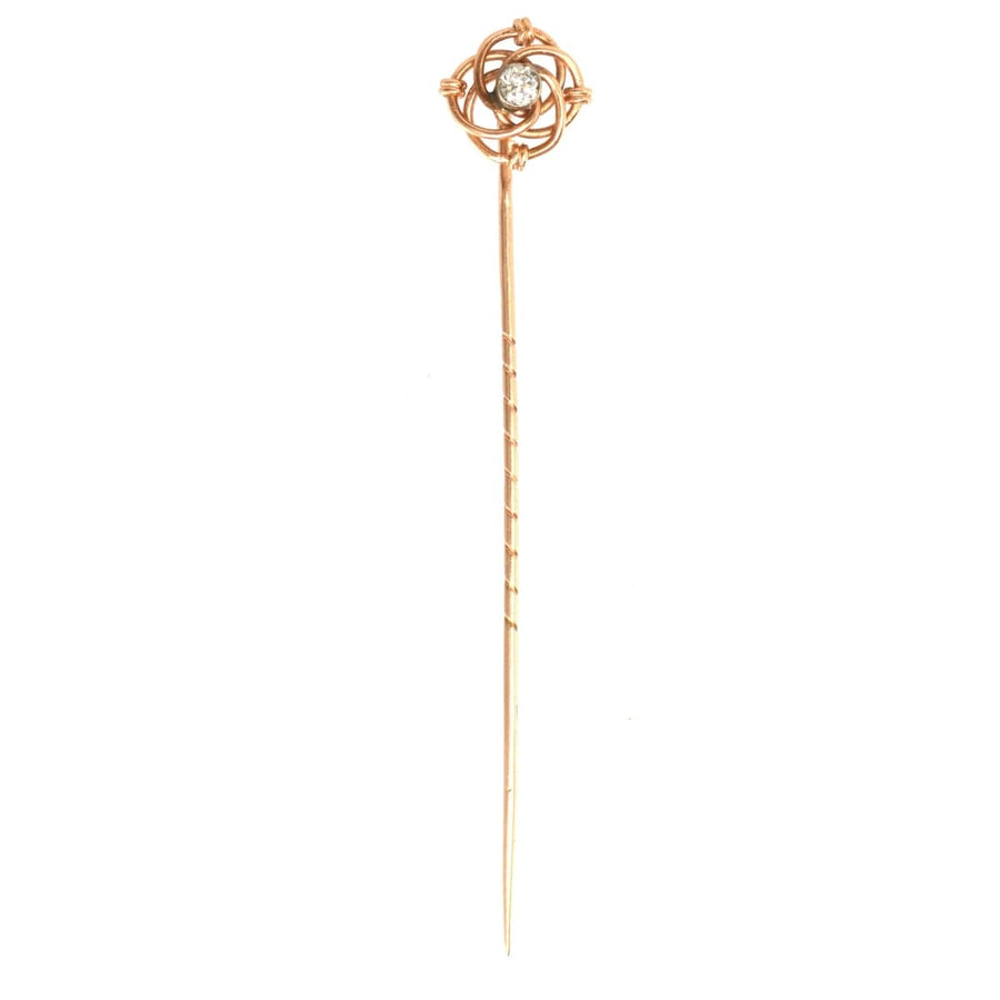 Early 20th century Austro-Hungarian 14ct gold tie pin with diamond, featuring a delicate knot design.