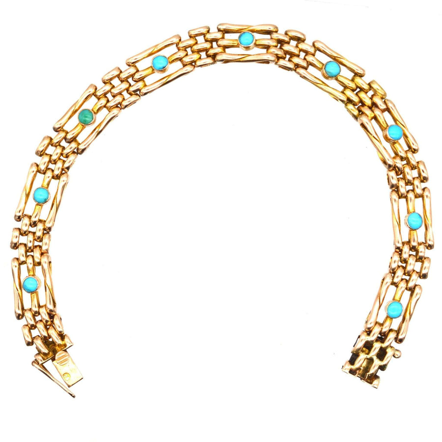Edwardian 15ct gold gate bracelet featuring turquoise stones, a classic and timeless jewelry piece from circa 1910.