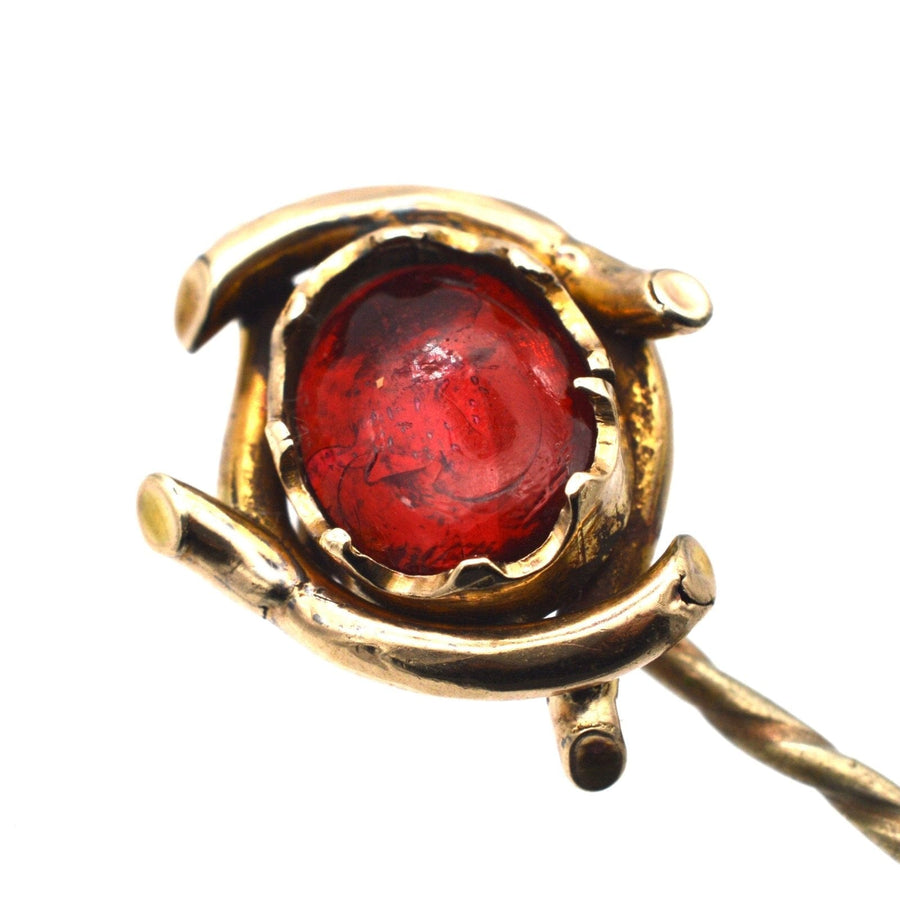 Edwardian 9ct gold tie pin featuring a vibrant red cabochon paste gem, perfect for adding style to a silk tie.