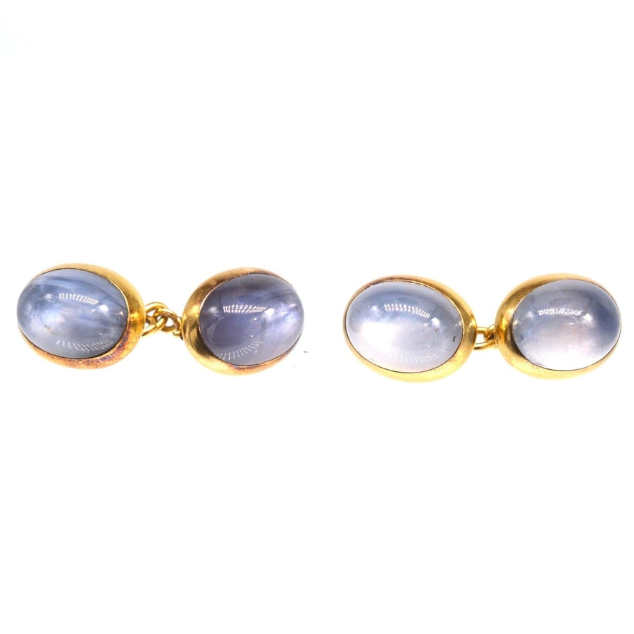 Elegant 18ct gold star sapphire cufflinks showcasing stunning asterism effect, circa 1910.