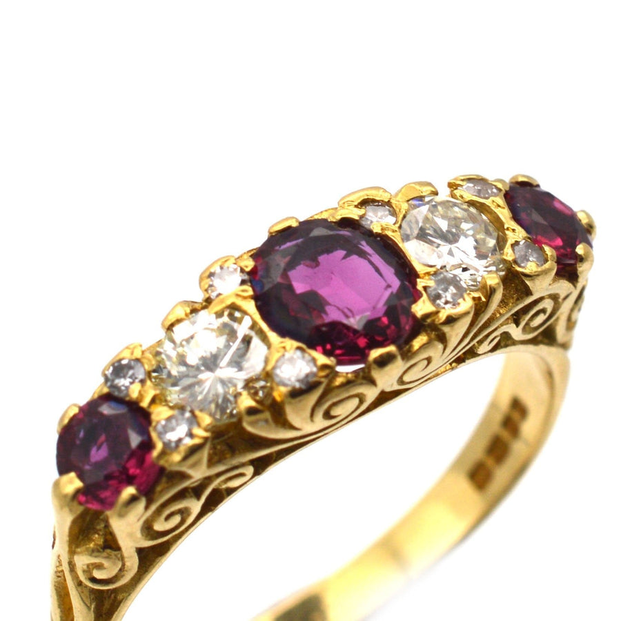 Victorian-style gold ring featuring rubies and diamonds, emblematic of 1970s craftsmanship.