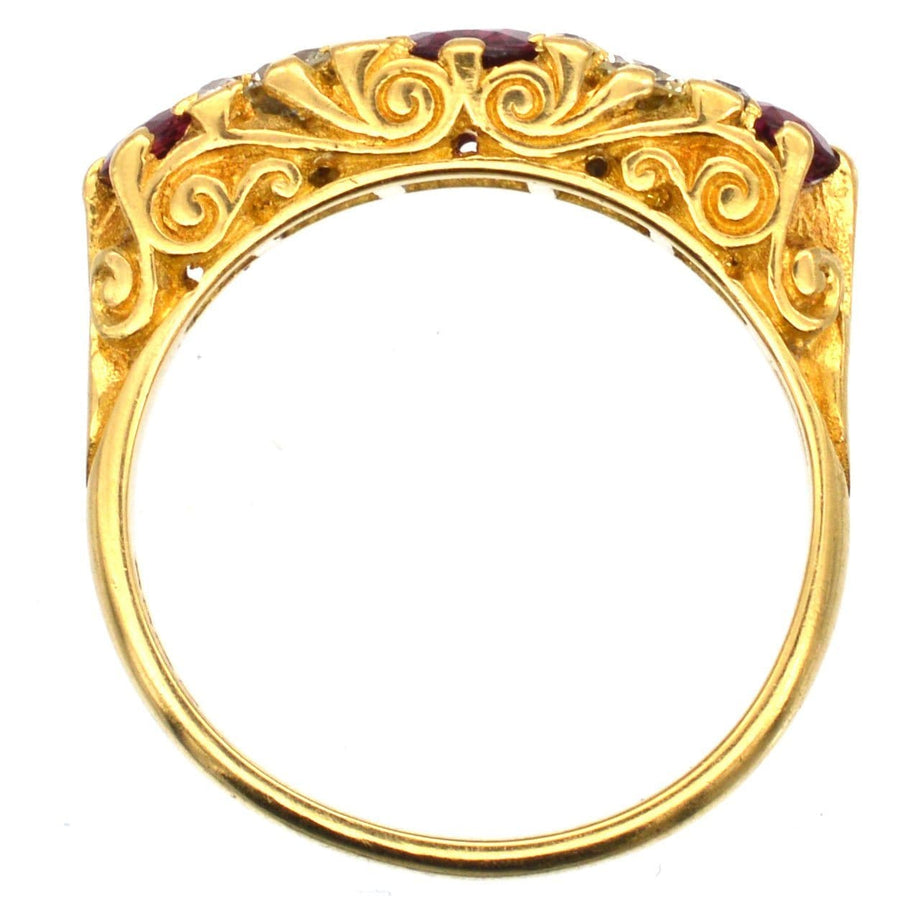 Victorian-style 1970s 18ct gold ring with ruby doublets and diamond details, showcasing intricate design.