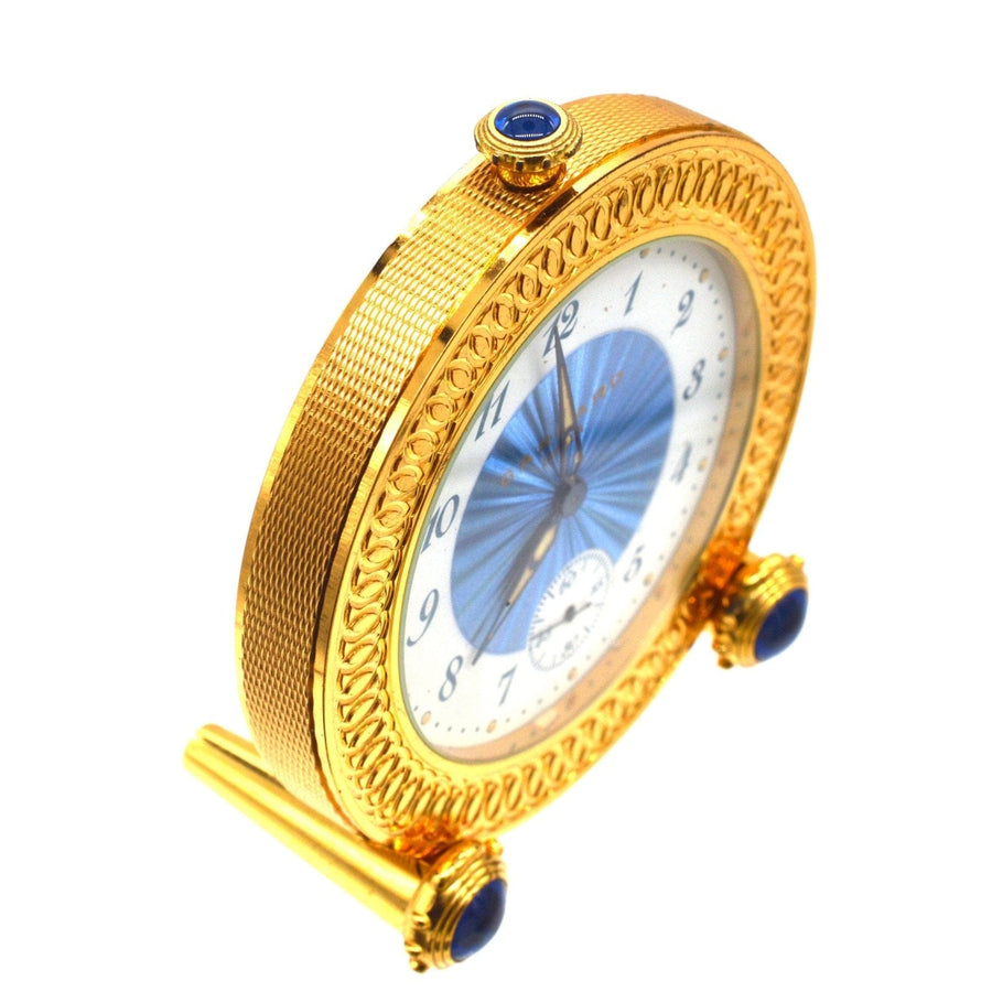 Vintage gilt metal travel alarm clock by Garrard of London, 1993 limited edition with sapphire-like cabochons.